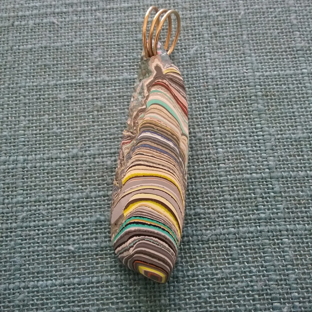 Fordite pendant